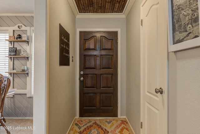 5417 89th St, Lubbock, TX 79424 - foyer with crown molding, baseboards, and tile patterned flooring