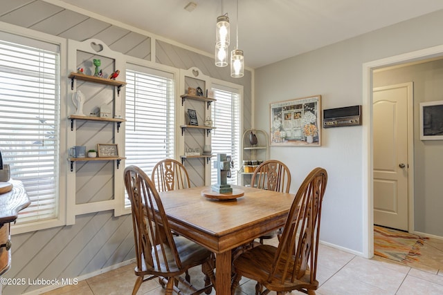 5417 89th St, Lubbock, TX 79424 - dining room with light tile patterned flooring and baseboards