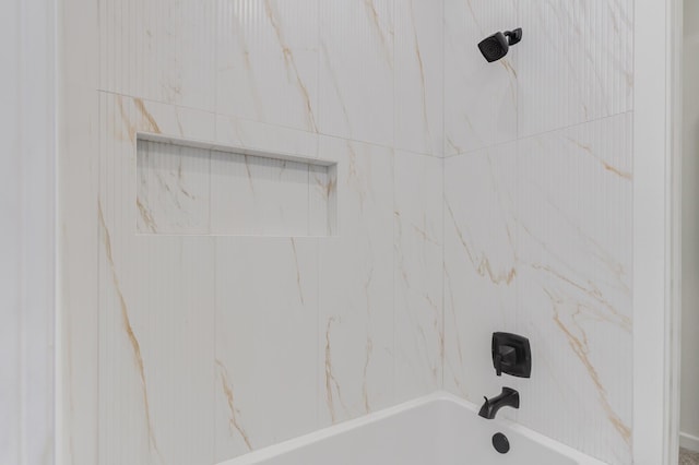 interior space with bathing tub / shower combination