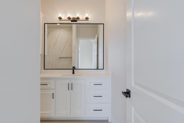 full bathroom with a shower and vanity