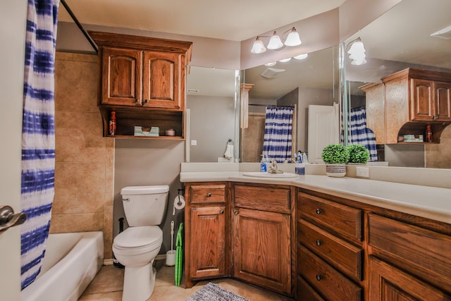 bathroom featuring toilet, vanity, shower / bath combination with curtain, and tile patterned floors