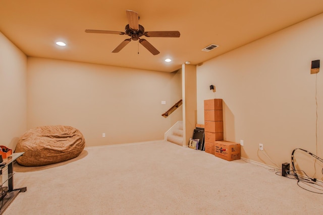 interior space with a ceiling fan, visible vents, carpet flooring, and recessed lighting