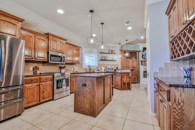 kitchen with light tile patterned floors, visible vents, dark stone counters, stainless steel appliances, and open shelves