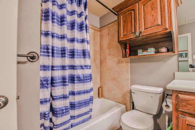 bathroom with toilet, shower / tub combo, visible vents, and vanity