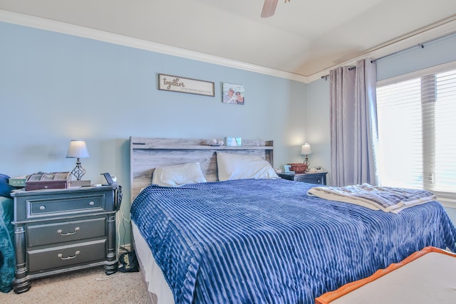 bedroom with ornamental molding, multiple windows, and a ceiling fan