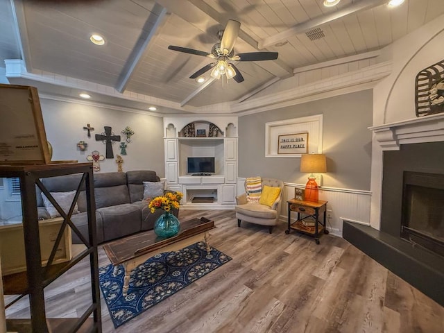 living room with wood ceiling, vaulted ceiling with beams, ceiling fan, and hardwood / wood-style flooring