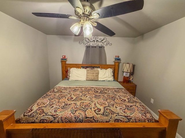 bedroom featuring ceiling fan
