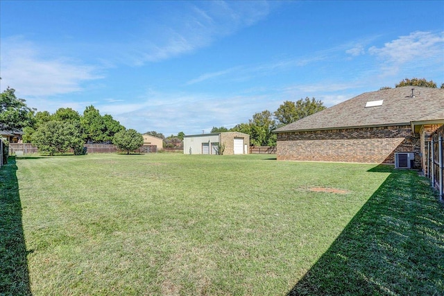 view of yard featuring central AC unit