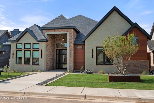 4606 138th Pl, Lubbock, TX 79424 - view of front of home with brick siding, a front yard, and a shingled roof