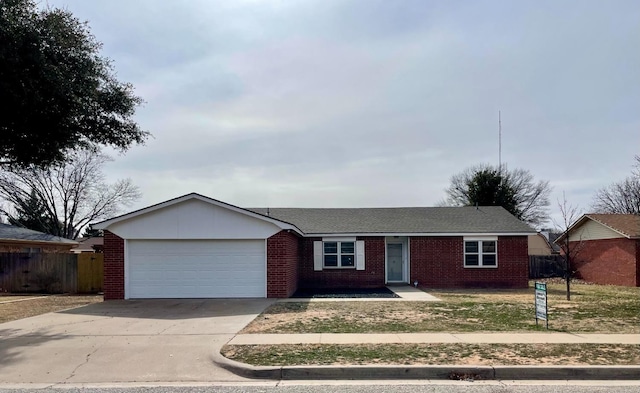 ranch-style home featuring a garage, concrete driveway, brick siding, and fence