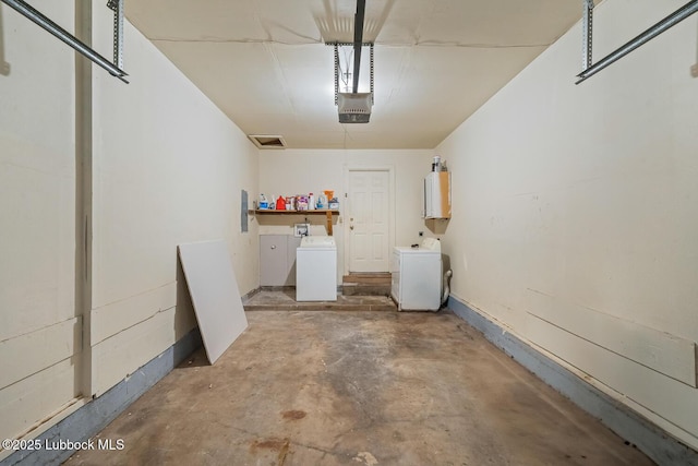 3415 39th St, Lubbock, TX 79413 - garage with a garage door opener and independent washer and dryer