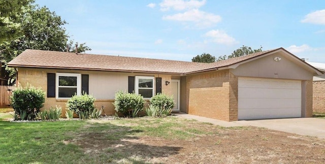 single story home featuring a garage and a front lawn