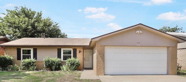 single story home with a garage