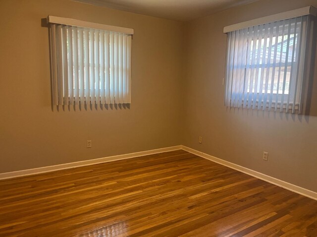 empty room featuring hardwood / wood-style floors