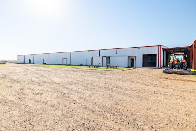 exterior space with an outbuilding