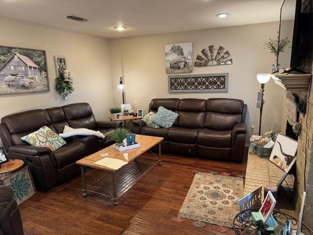 living room featuring dark wood-type flooring