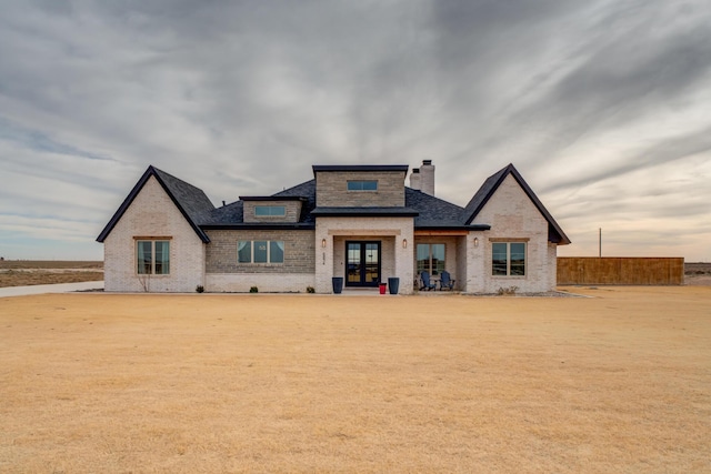 view of front facade featuring french doors