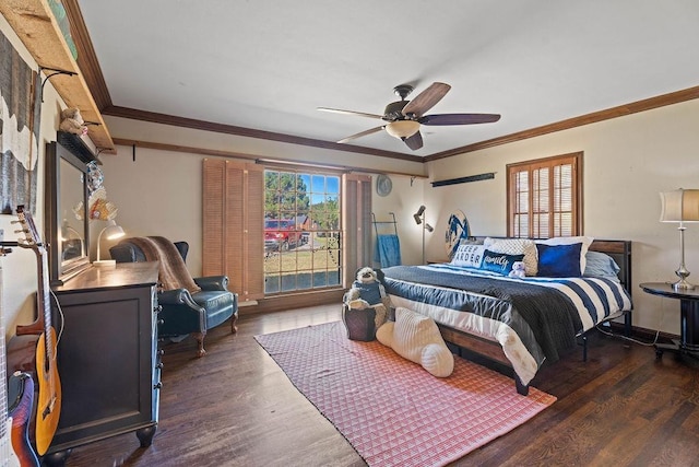 bedroom featuring crown molding, dark hardwood / wood-style floors, and ceiling fan