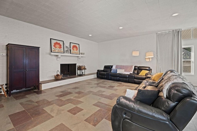 living room featuring brick wall