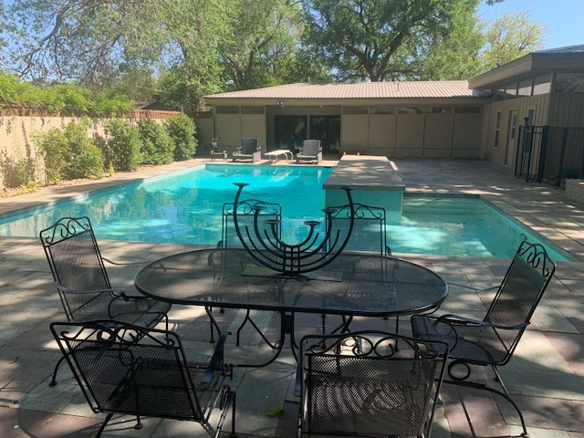 view of pool with a patio area