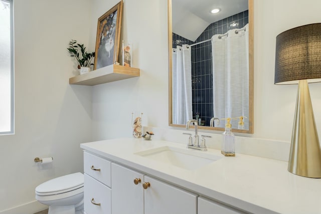 4309 136th St, Lubbock, TX 79423 - full bath featuring toilet, vanity, lofted ceiling, a shower with shower curtain, and baseboards
