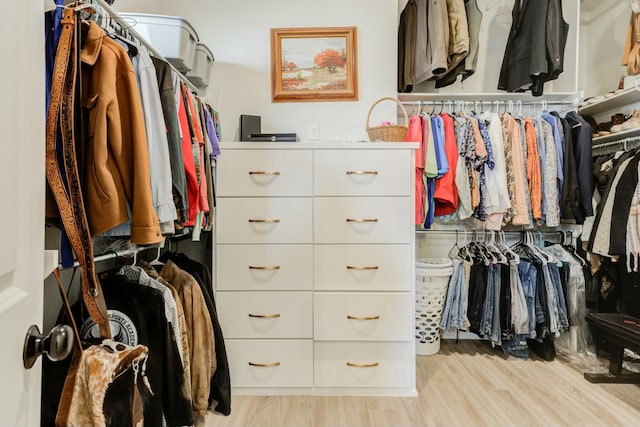 4309 136th St, Lubbock, TX 79423 - walk in closet with light wood-style flooring