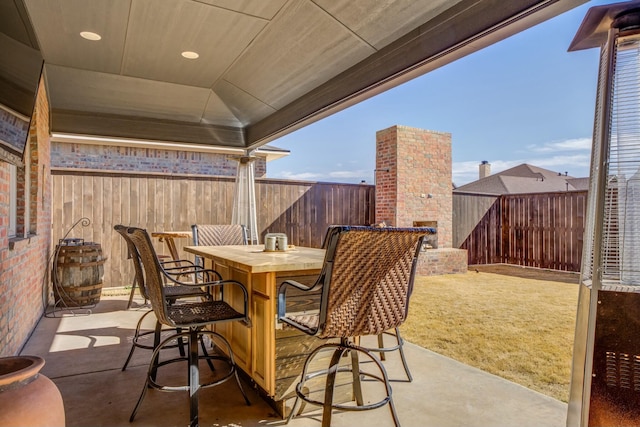4309 136th St, Lubbock, TX 79423 - view of patio featuring a fenced backyard and outdoor dining area