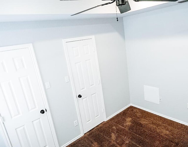 6916 Fulton Ave, Lubbock, TX 79424 - interior space with dark carpet, baseboards, and ceiling fan