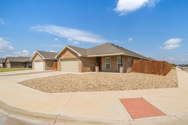 ranch-style home featuring a garage