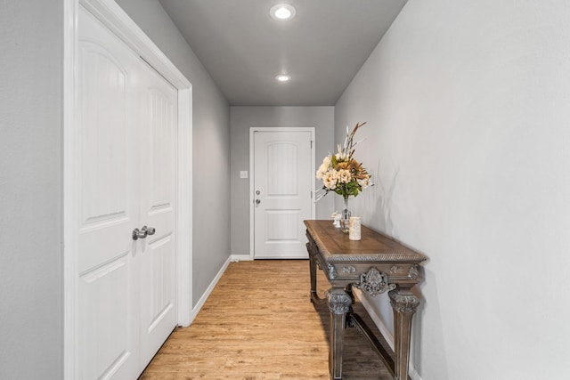 doorway with light hardwood / wood-style flooring