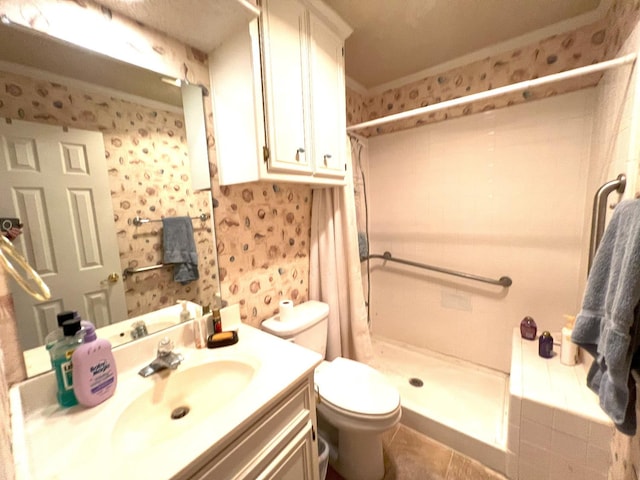 bathroom featuring walk in shower, ornamental molding, vanity, and toilet