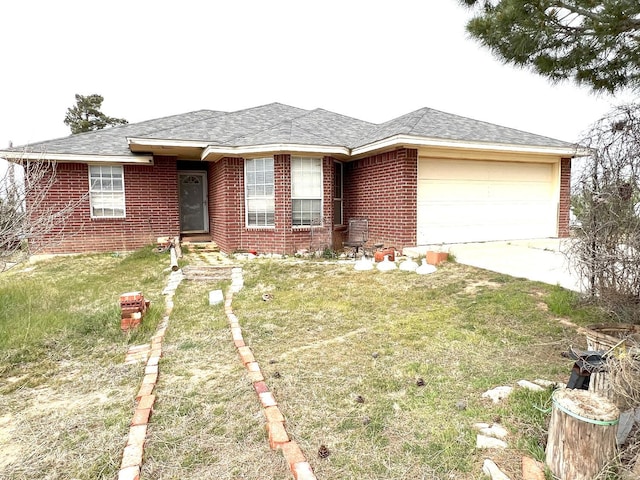 ranch-style house with a garage and a front yard