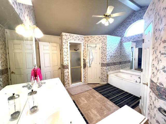 bathroom with ceiling fan, vanity, separate shower and tub, and vaulted ceiling with beams