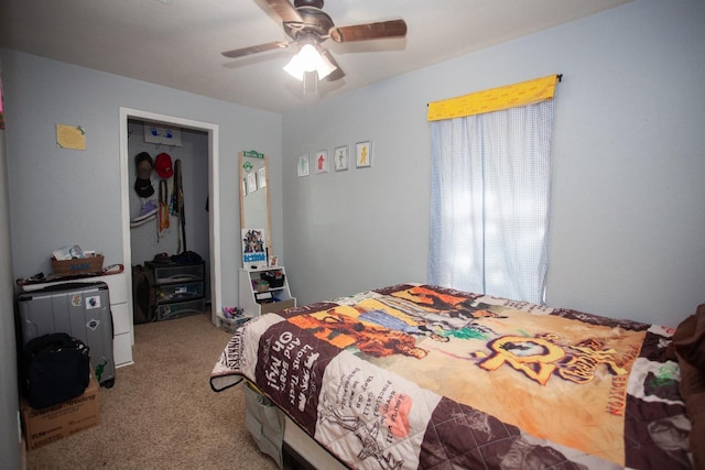 carpeted bedroom with ceiling fan