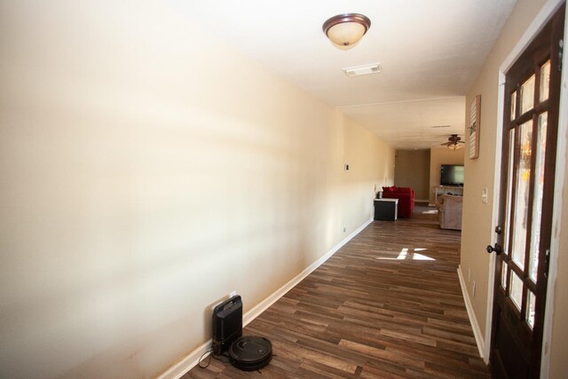 hallway featuring dark hardwood / wood-style floors