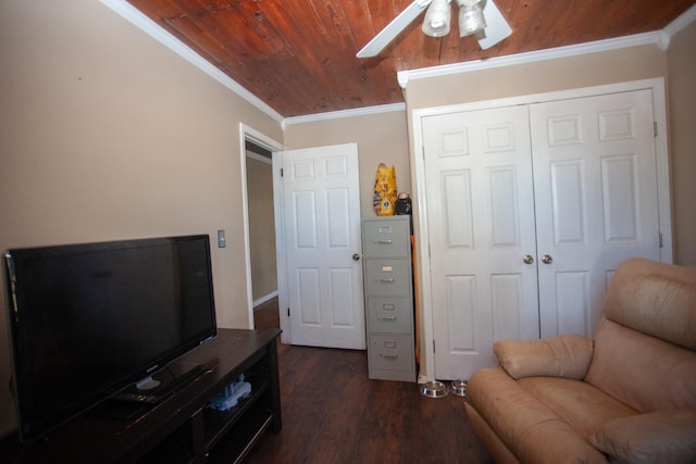 sitting room with crown molding, ceiling fan, dark wood-type flooring, and wooden ceiling