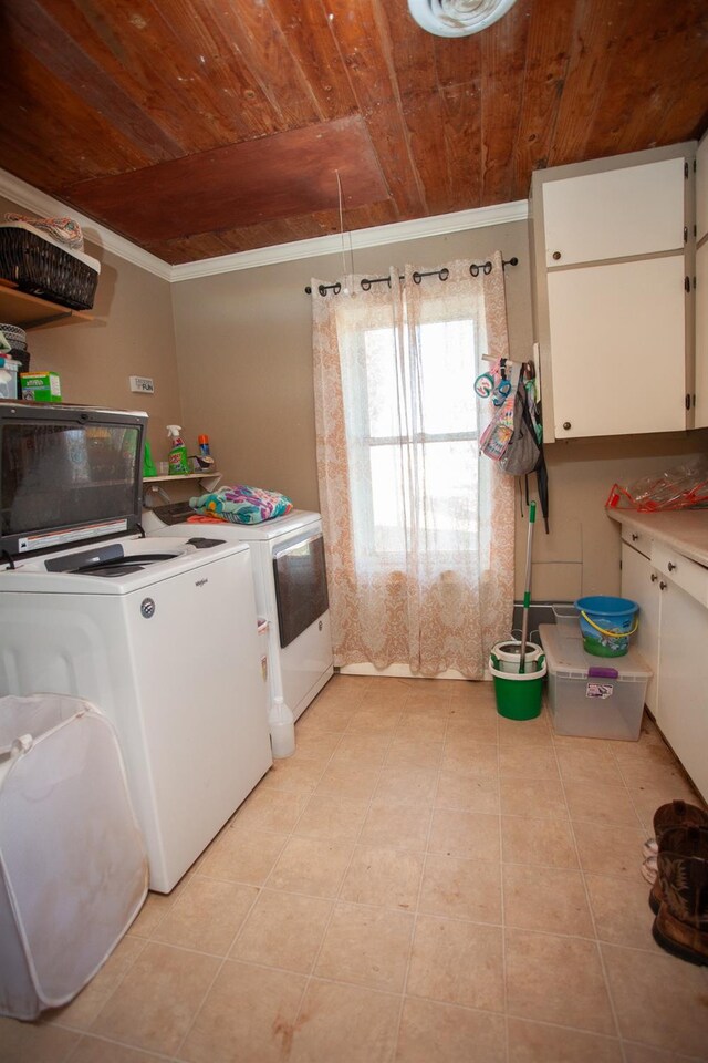 laundry area featuring cabinets, separate washer and dryer, and wood ceiling