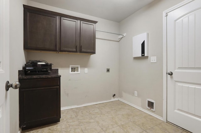 laundry room with cabinet space, hookup for a washing machine, electric dryer hookup, and baseboards