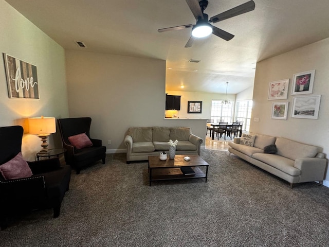 living room with dark carpet, vaulted ceiling, and ceiling fan