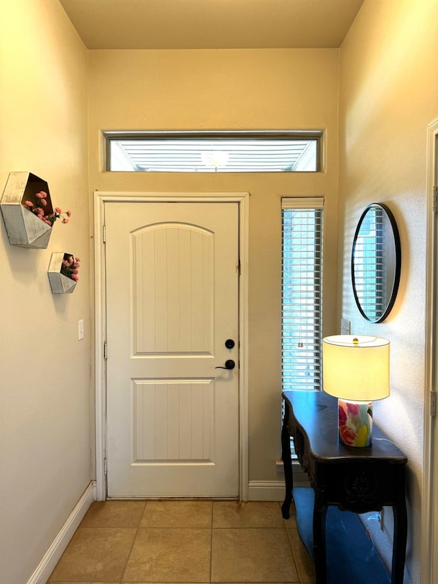 entrance foyer featuring light tile patterned flooring