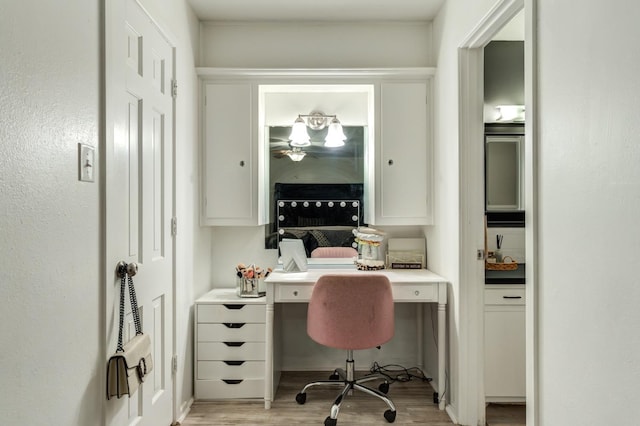 office space featuring light wood-type flooring