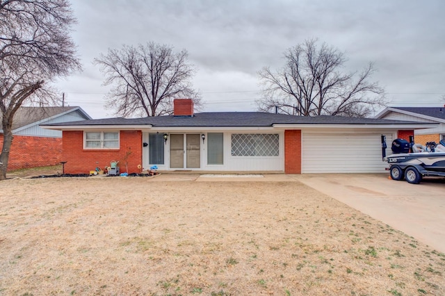 ranch-style home with a garage