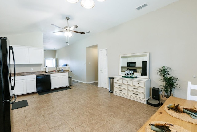 kitchen with lofted ceiling, sink, ceiling fan, black appliances, and white cabinets