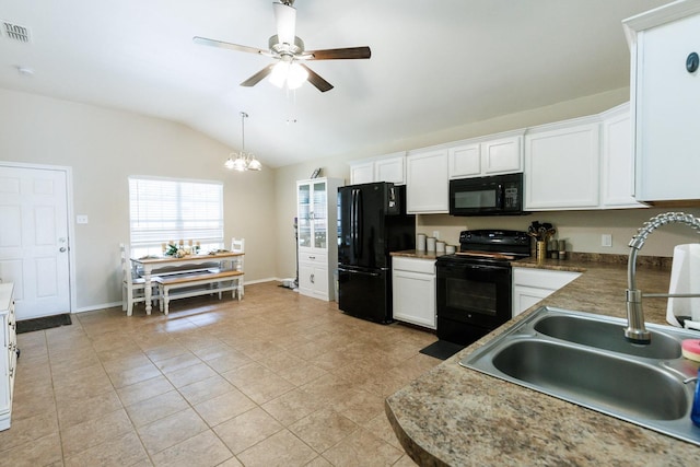 kitchen featuring sink, black appliances, vaulted ceiling, light tile patterned floors, and white cabinets