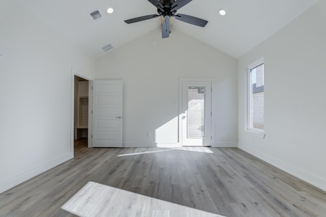 11806 Kenosha Ave, Lubbock, TX 79423 - spare room featuring ceiling fan, wood finished floors, and high vaulted ceiling