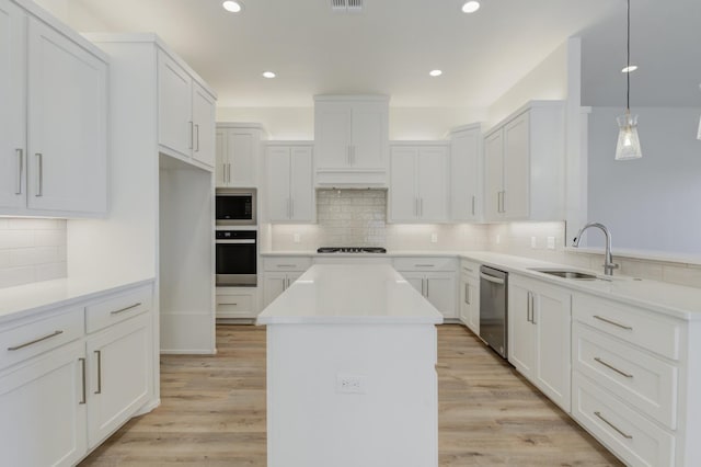 11806 Kenosha Ave, Lubbock, TX 79423 - kitchen featuring black oven, dishwasher, built in microwave, decorative backsplash, and a center island