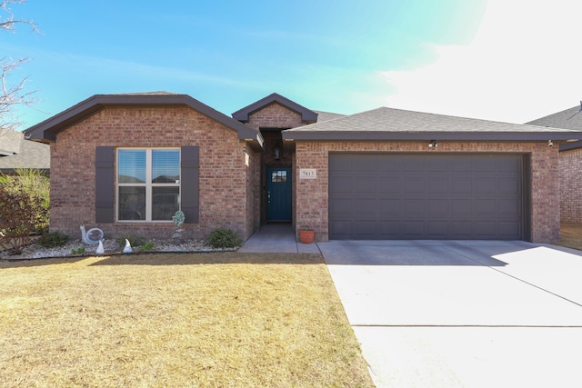 7813 89th St, Lubbock, TX 79424 - ranch-style home with brick siding, an attached garage, a front yard, and concrete driveway