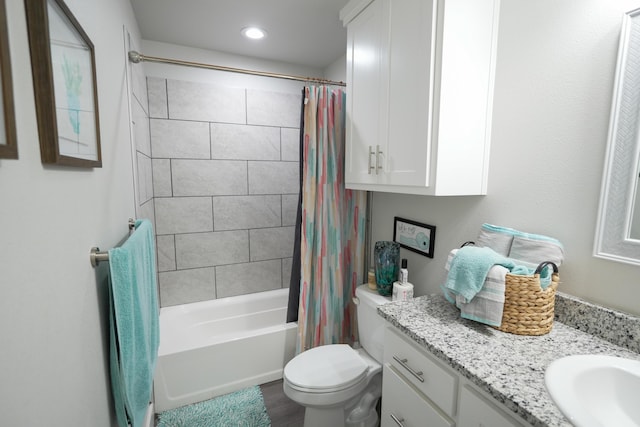 7813 89th St, Lubbock, TX 79424 - full bathroom featuring shower / bath combo, wood finished floors, vanity, toilet, and recessed lighting