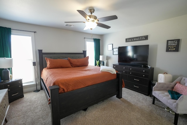 7813 89th St, Lubbock, TX 79424 - bedroom with multiple windows, light colored carpet, and visible vents