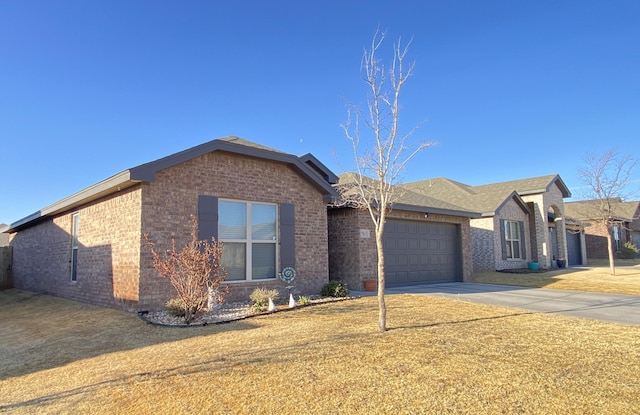 7813 89th St, Lubbock, TX 79424 - ranch-style home featuring brick siding, an attached garage, driveway, and a front yard